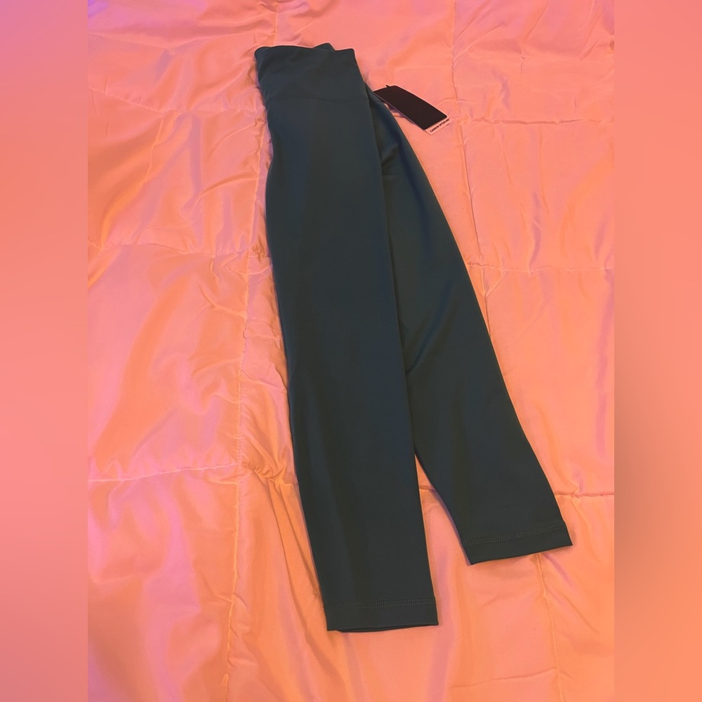 teal 90 degree leggings in color “deep lake” size small